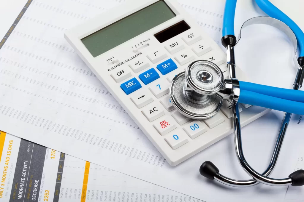 health care costs stethoscope and calculator 2022 05 19 14 24 46 utc.jpg